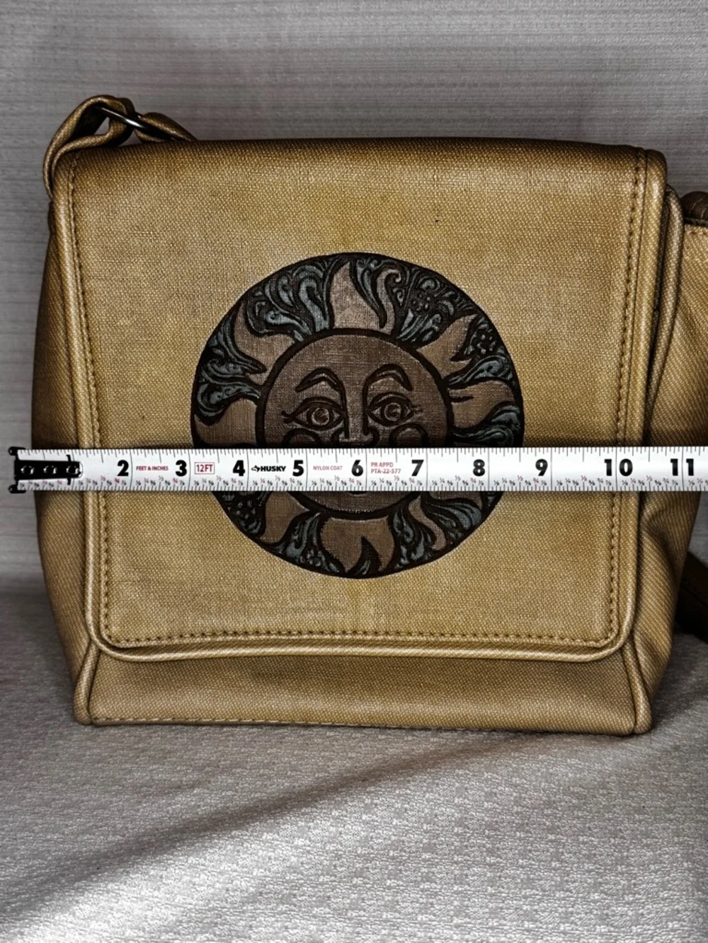 Metallic Gold Crossbody Bag with Sun Medallion